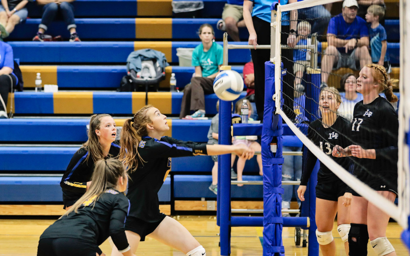 Caroline Witte gets under the ball with a dig.