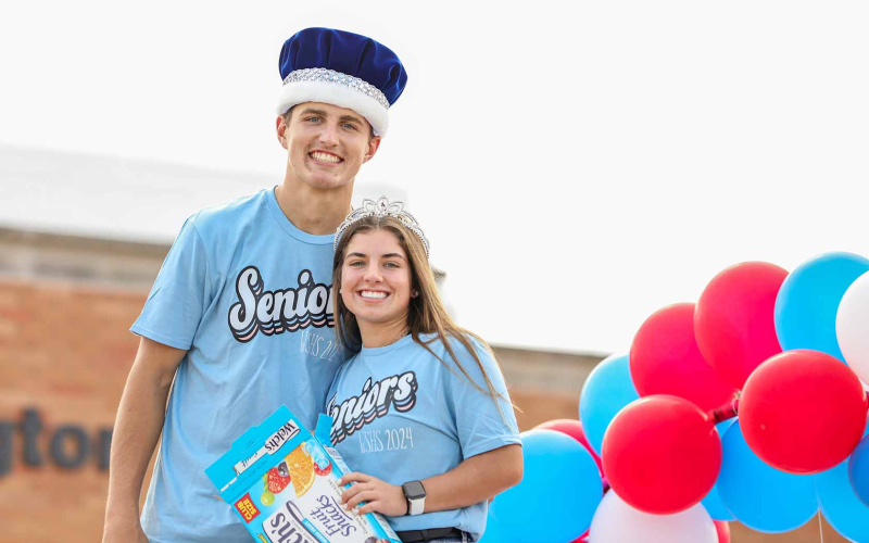 King Brock Krueger and Queen Alyssa Grohs are shown atop the senior float.