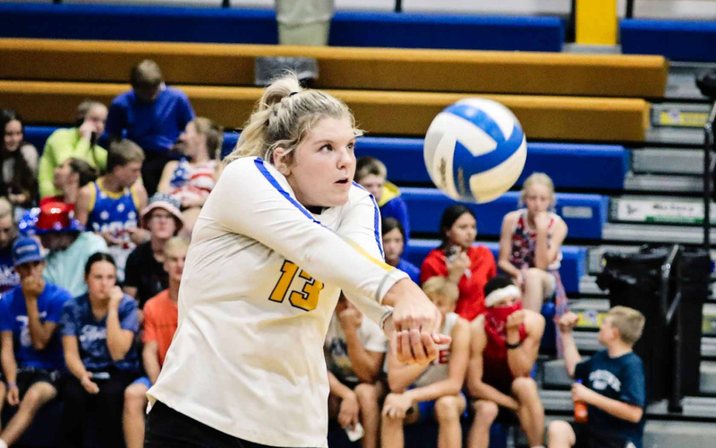 Avery Orth (center) had 21 kills and 16 blocks in addition to earning an impressive milestone: 1,000 digs.
