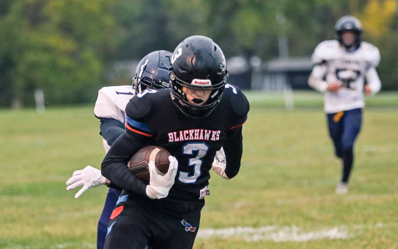 Brock Krueger carries the football during Class 11B action Friday night in Wessington Springs. The Blackhawks fell to Rapid City Christian 7-0 in the fourth quarter after a scoreless battle during the final game of the regular season.
