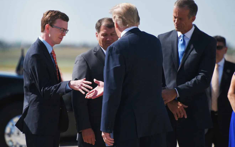 President Donald Trump shakes hands with South Dakota Rep. Dusty Johnson after he lands Friday, Sept. 7, 2018, in Sioux Falls. Trump visited to help campaign for Kristi Noem’s gubernatorial campaign. (PHOTO: ARGUS LEADER)