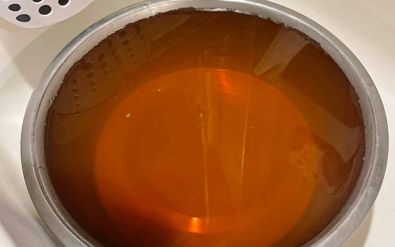 Water from the kitchen tap of a Wessington Springs home Saturday, October 7, 2023. The City of Wessington Springs is asking residents to report rustcolored water to City Hall as soon as it presents.