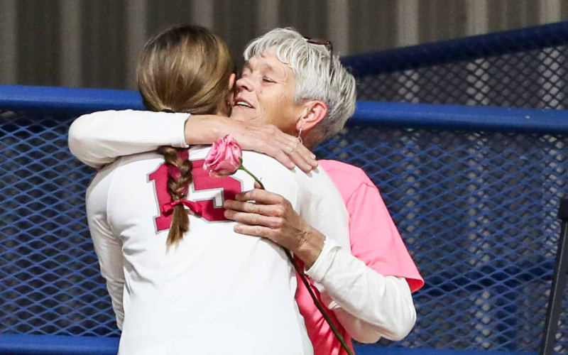 The Lady Spartans presented a pink rose in honor or memory of someone in attendance touched by cancer. Ashlyn Weber presented the rose to her Grandma Sandy Beckman in honor of her cancer fight.
