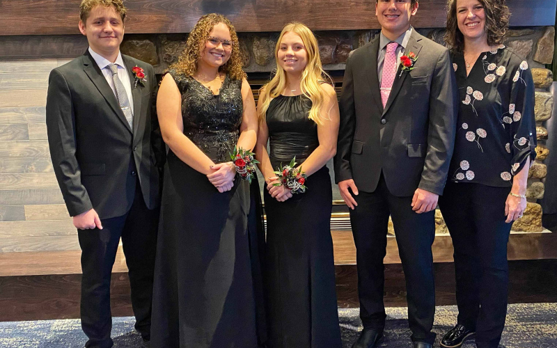 Wessington Springs’ all-state quartet comprised of (left to right) Will Bruckner, Taylor Braun, Raylee Fagerhaug and Blake Miller performed with hundreds of the top high school musicians in the state last weekend. They are pictured with WSHS Choir Director Julie Fastnacht.