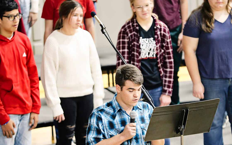 The high school choir sang “God Bless the USA” with a powerful solo delivered by Carter Gaikowski.