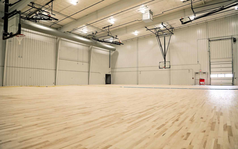 The gymnasium floor has been sealed and is in the midst of the curing process. Once cured, bleacher installation is next on the list.