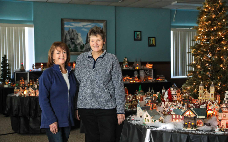 By combining both their Christmas Village collections, Becky Thompson and Gloria Vavra transformed the County Courthouse into a beautiful winter wonderland for the whole community to enjoy.