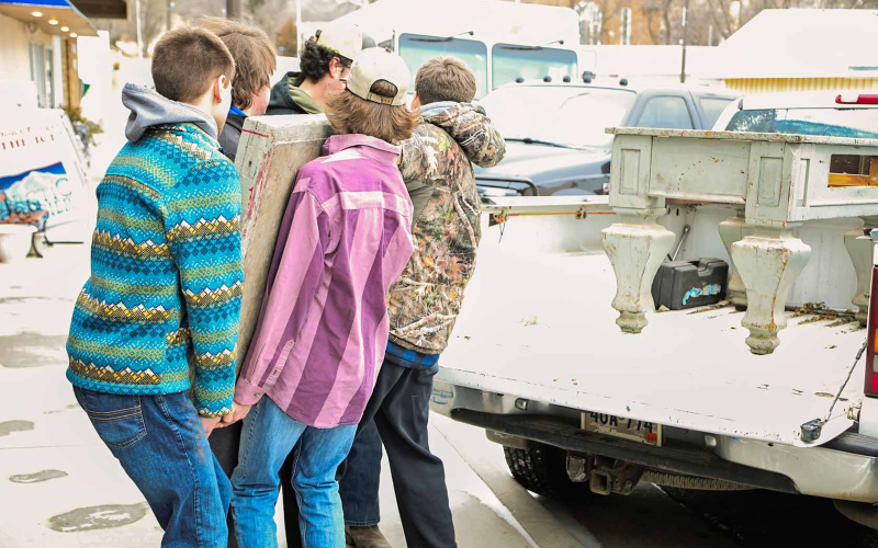 Wessington Springs High School FFA Chapter members lent their braun to carry out and load up the weighty marble top.