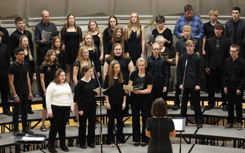Always a treat, the community choir performed with the high school choir, singing “Sleighride.”