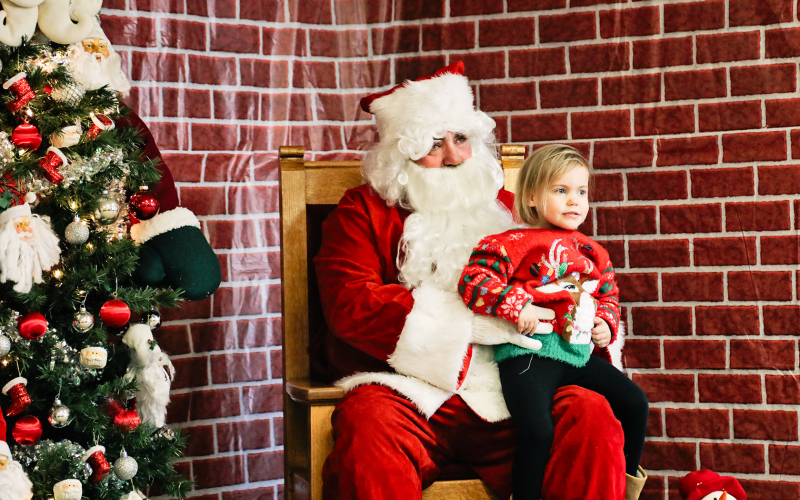 Although reluctant at first, Hazel Schroeder eventually warmed up to the idea of a visit with Santa.