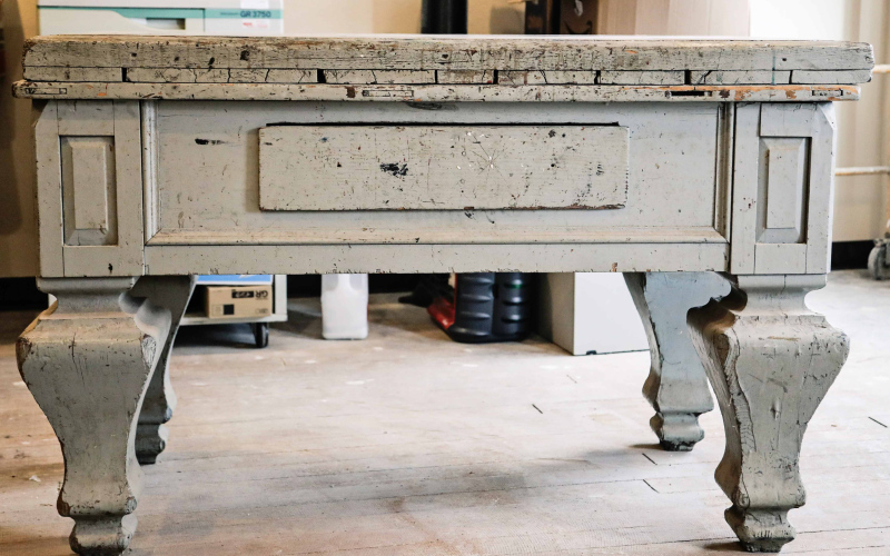 An antique, more than a century old marble-topped work table, well-used by pressmen and newspaperwomen and men in the True Dakotan since the building was erected in 1915.