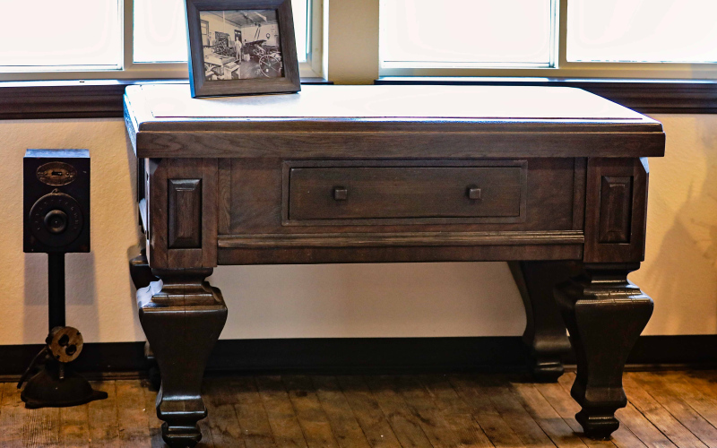 The completely renovated table is perched proudly under the northwest window of the recently renovated True Dakotan building.