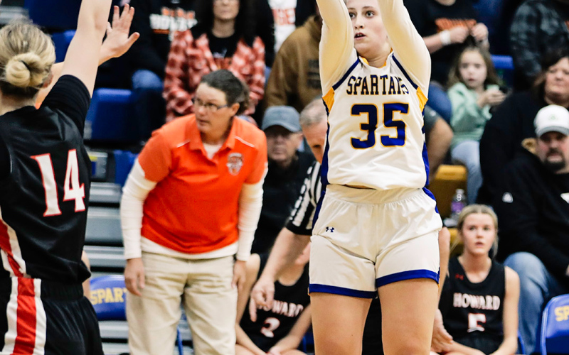 Kerstynn Heim lines up for a shot during Saturday’s home basketball action.