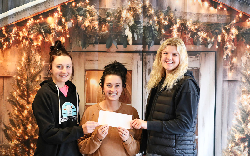 Pictured left  to right is WSHS senior Carissa Scheel, WSACF Board Member Bethany Schimke and WSHS senior Avery Orth.