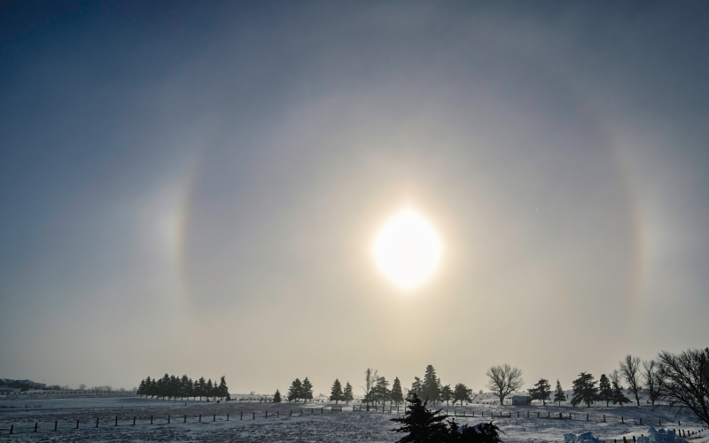 Sundogs appeared in the sky over the Jerauld County prairie last Friday. Sundogs are colored spots of light that develop due to the refraction of light through ice crystals. This weather phenomenon generally appears in only extreme cold temperatures needed to form ice crystals. Temperatures were recorded well below zero at -18 with a “feel like” wind chill temperature of -48.