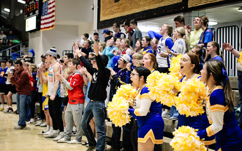 The student section cheers on the Lady Spartans.