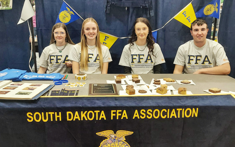 Wessington Springs FFA Chapter Members kicked off FFA Week with a booth at the Farm, Home and Health Show Monday. Shown left to right are: Mercedes Jones, Abby Kolousek, Carissa Scheel and Ridge Roduner.