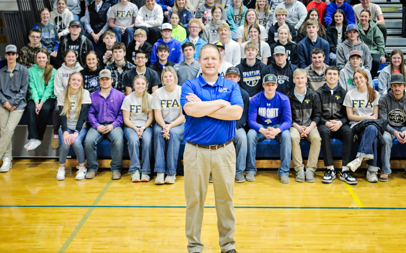 KRISTI HINE / TRUE DAKOTAN The South Dakota Association of Secondary School Principals (SDASSP) Announced that the South Dakota High School Principal of the Year is none other than Wessington Springs Middle / High School’s Jason Kolousek. He is shown above with the middle school / high school student body in the bleachers behind him at the main gymnasium.