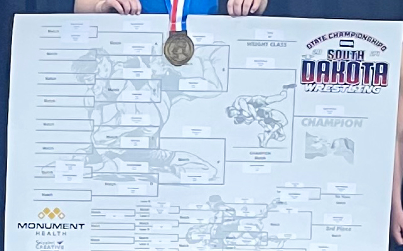 Zayden Wolfcale stands atop the podium after winning 1st in the state in his weight class. PHOTO COURTESY SUMMER SCHOOLER