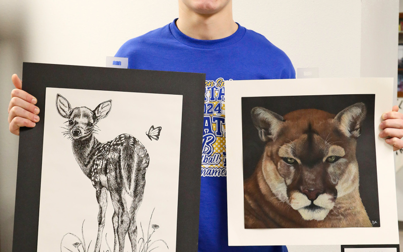 Brock Krueger with “Joy in the Springtime,” 5th place in the Drawing category and “The Look of Intimidation,” 3rd place in Colored Drawing.
