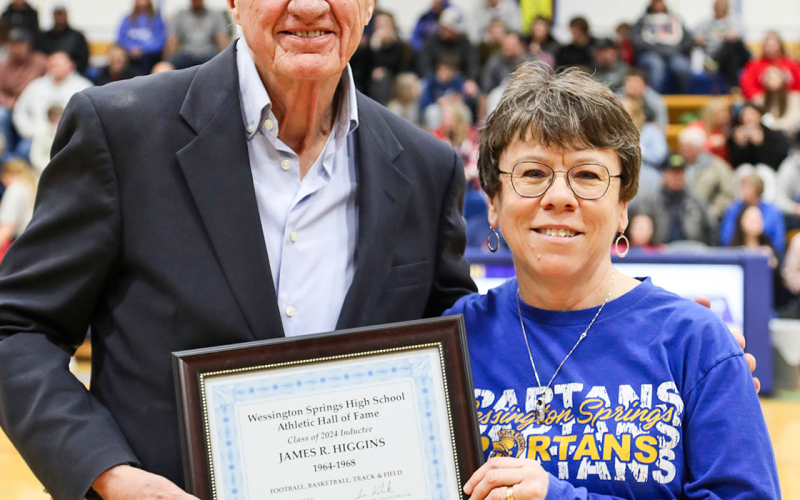 Representing the third annual class of hall-of-famers, 2024 WSHS Athletic Hall of Fame inductees were honored Friday, February 23 at the home double header basketball game. Shown with WSHS Athletic Hall of Fame Committee Member Julie Kraft is one of this year’s inductees, James R. Higgins.