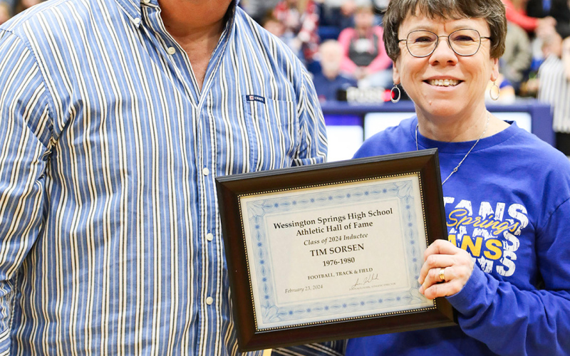 Representing the third annual class of hall-of-famers, 2024 WSHS Athletic Hall of Fame inductees were honored Friday, February 23 at the home double header basketball game. Shown with WSHS Athletic Hall of Fame Committee Member Julie Kraft is one of this year’s inductees, Tim Sorsen.