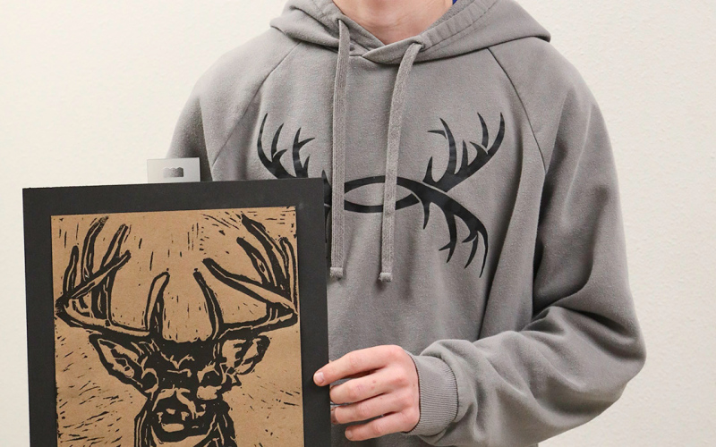 JD Thompson with “The Big One,” 2nd place in Print making division.