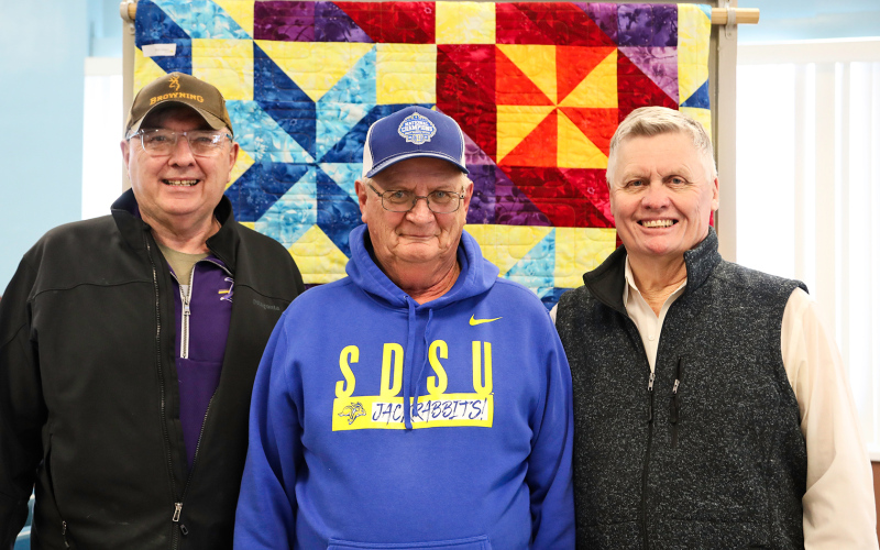 After more than five decades in the work force, Kelly Larson was issued a mayoral commemoration to celebrate his retirement in a heartfelt ceremony organized by his close friend Tom Riddle on February 16, 2024. Shown left to right are Tom Riddle, Kelly Larson and Mayor Brian Bergeleen.