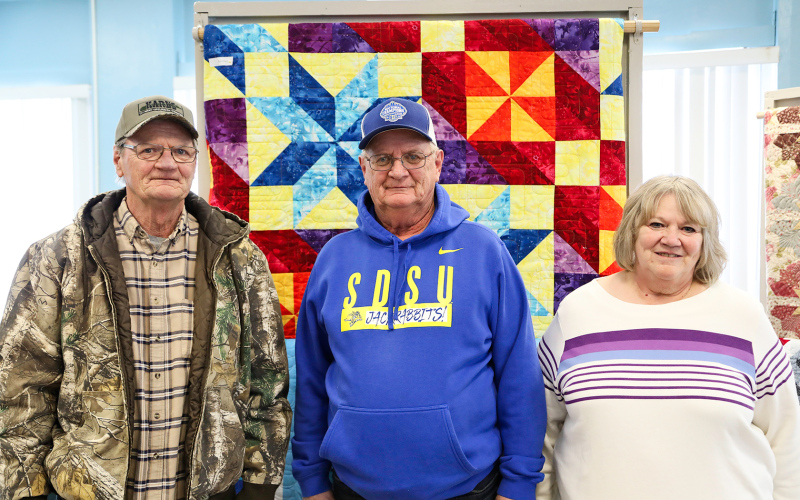 Of the many friends, family and coworkers in attendance, Larson is shown with two of his siblings, Roger Larson and Connie Ness.
