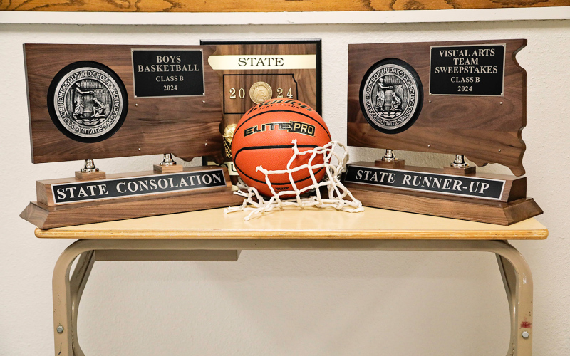 The hallways of Wessington Springs High School display some added bling after this month’s impressive accomplishments from the boys basketball team and visual arts students.