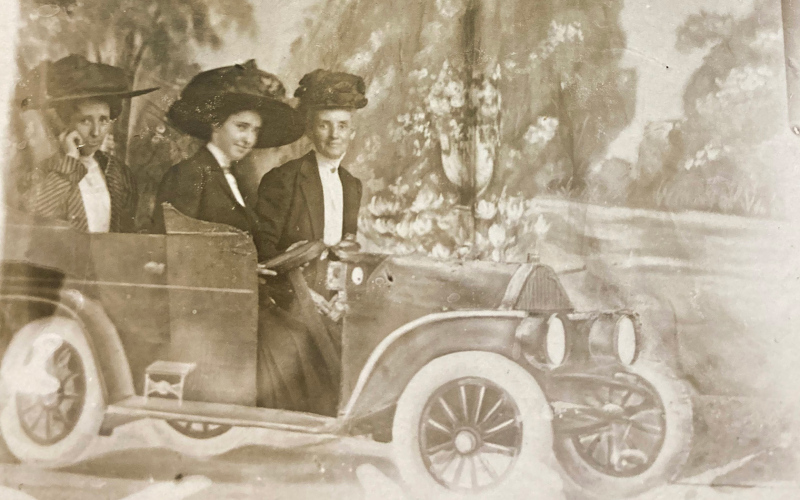 Whitney is shown in the back seat, with her sister and mother in front.