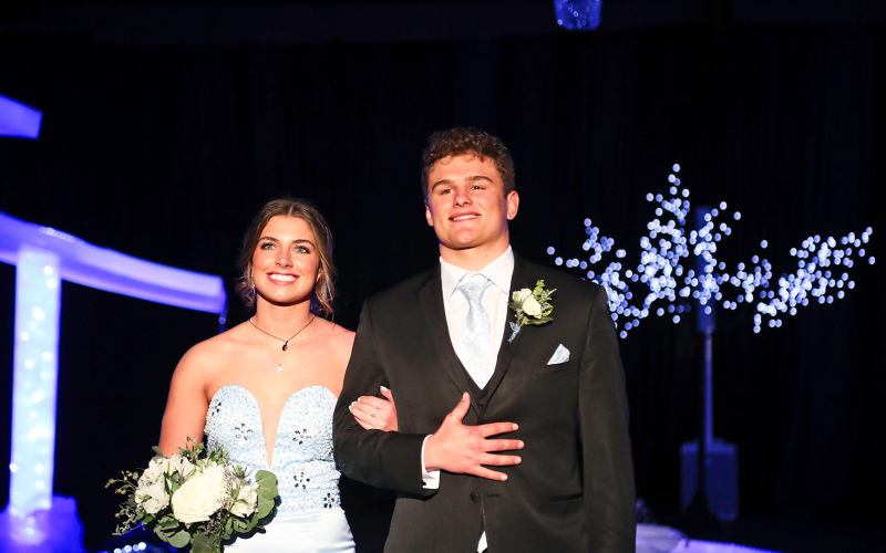 Alyssa Grohs is escorted by Keegan Haider.