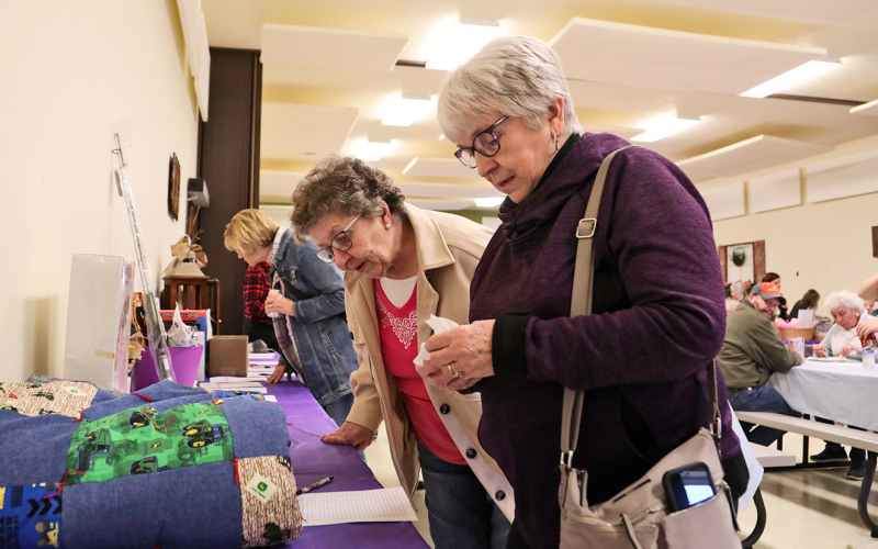 Hundreds of attendees bid on silent auction items.