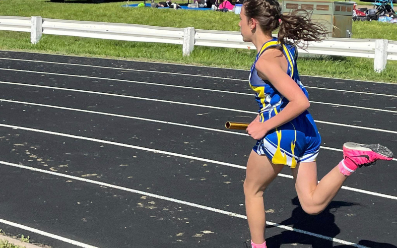 In the 800m relay we ran Alyssa Grohs, Kaebry Dixon, Mariah Messmer, and Kenzie Kolousek (shown above) who ran 1:59.29 for 5th place.