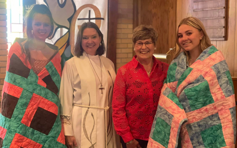 Our Saviors Lutheran Church honored seniors with beautiful quilts, handmade by Peggy Fagerhaug. Shown left to right are: Hannah Heezen, Pastor Nancy Rieke, Peggy Fagerhaug and Raylee Fagerhaug.