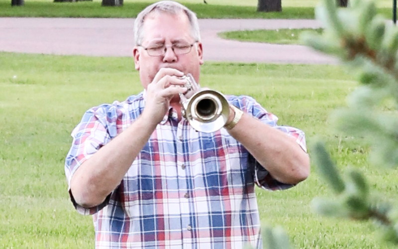 Leo Jensen played “Taps” at the Alpena Community Center.