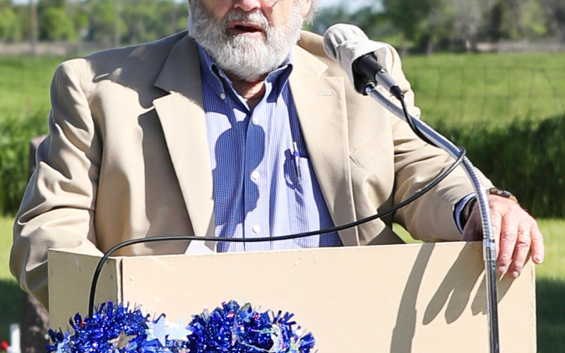 Tom Dean spoke on the necessity for the living to continue to do the work that those that lost their lives began.
