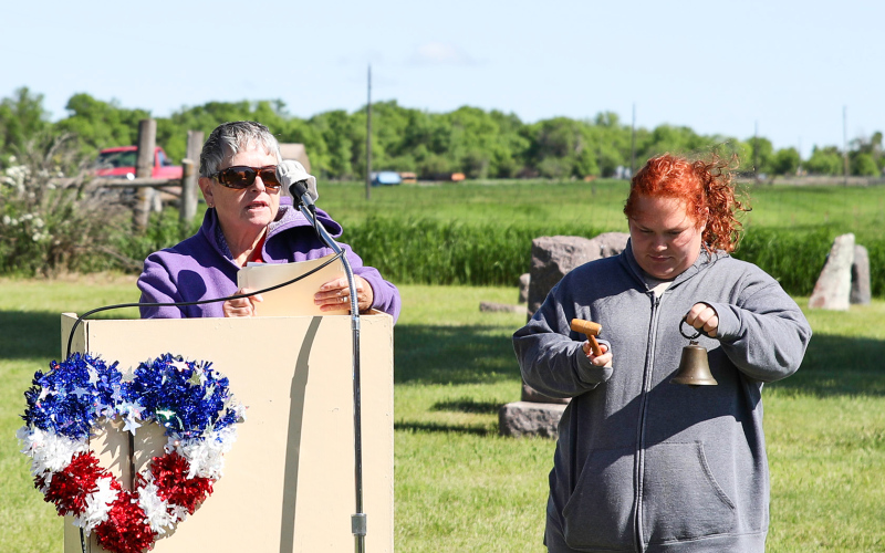 Woodruff read the names of all veterans buried at Hope Cemetery. As each name was read, Katelin Deneke rang the bell, signifying sorrow and demonstrating respect.