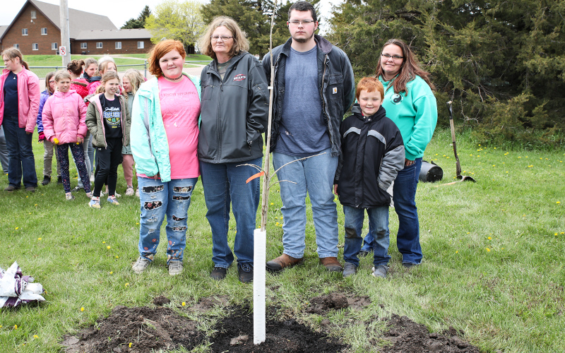 Tom and Kathy Dean, who donated the tree, along with friends and family of Carothers, planted a bur oak at the south end of the playground. Reba’s family was present at the ceremony and included Rayna Carothers, Rebecca (Carothers) Doty, Gage Doty, Dean Carothers and Kylie Carothers.