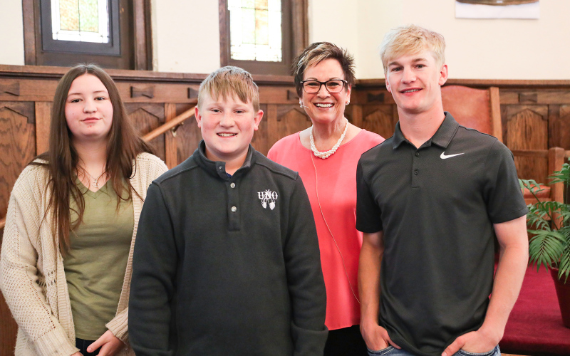 The Wessington Springs Methodist Church family prayed over eighth grade and high school graduates. Pictured left to right are: Bailey Roduner, Ryder Roduner, Pastor Cheri Van Gorp and Blake Larson.