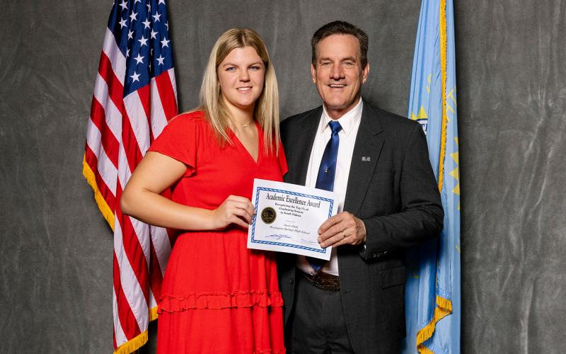 Wessington Springs High School senior Avery Orth was chosen as the “Best and Brightest” designee for Wessington Springs. She is shown woth Lieutenant Governor Larry Rhoden. PHOTO COURTESY ASBSD