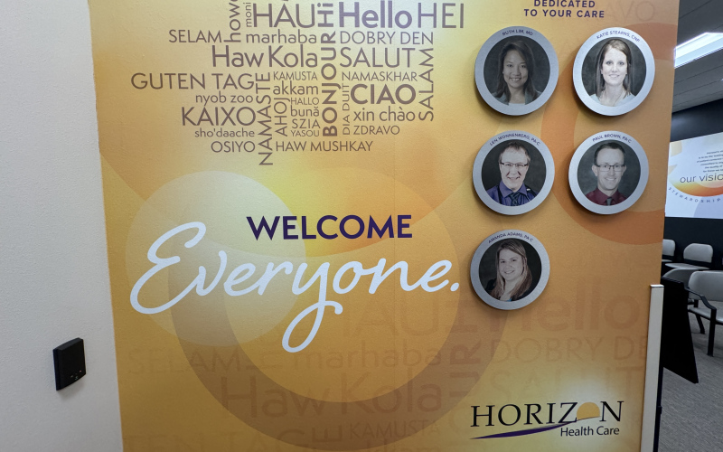 This sign in the entrance of the James Valley Community Health Center in Huron, S.D., photographed April 26, 2024, gives patients a sense of comfort that people of all backgrounds will be welcome at the clinic. PHOTO: BART PFANKUCH/ SOUTH DAKOTA NEWS WATCH