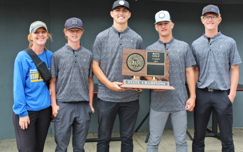 PHOTO COURTESY SDPB Shown left to right after winning the Class B State Boys’ Golf Tournament last Tuesday are: Head Golf Coach Regina Teveldal, JD Thompson, Brock Krueger, Blake Larson and Luke Larson.