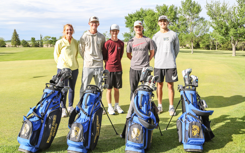 Shown at Friday's community send off for the state-bound Spartans are, left to right: Head Golf Coach Regina Teveldal, Luke Larson, JD Thompson, Blake Larson and Brock Krueger.