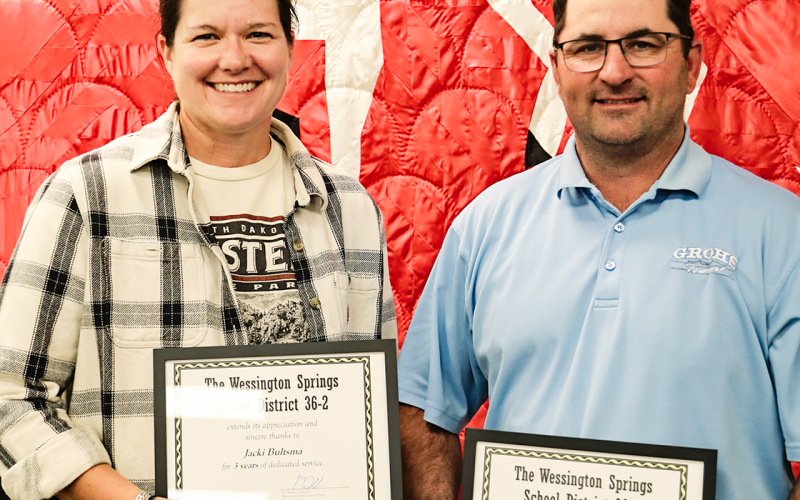 Jacki Bultsma and Todd Grohs display recognition certificates for their service on the Wessington Springs Board of Education. Bultsma served three years and Grohs served 13 years. Jennifer Jensen, not pictured, was also honored for four years of service. KRISTI HINE / TRUE DAKOTAN