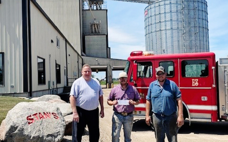Alpena Fire Department’s Fire Chief, Ryder Schweitzer, (center) received the $3000 raised at the 12th Annual Brett Boomer Memorial Golf Classic. He is shown with Volunteer Fireman Chris Albrecht, (right) and Todd Boomer, (left). Proceeds from the event are used to help improve the AFD’s firefighting/rescue equipment and for continued training.