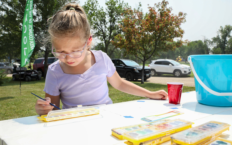 Eleanore Moe tries her hand at watercolor painting.