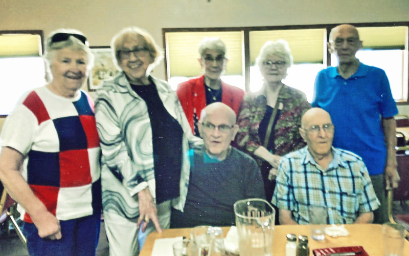 Pictured from left to right standing: Deloris Grohs Fuegen, Maureen (Mickey) Rhodes Hein, Vera Speck Weber, Kathleen Wall Balster, Dayle Winter. Seated: Don Grohs and Lloyd Kraft.