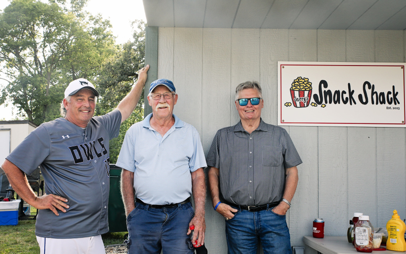 Owls Manager Joe Butterfield is shown with Larry Keeton and Brian Bergeleen during Sunday’s games.