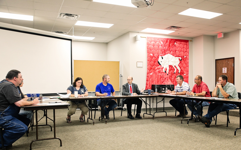 Shown left to right are Board of Education Members Darrick Van Dyke, Sara Thompson, Business Manager Marcy Argo, Board Chairman Dustin Weber, School Superintendent Michael Ormsmith, new School Board Members Scott Kolousek, Gene Gaikowski and Jonathan Arhart. Not pictured, Derek Zastrow.